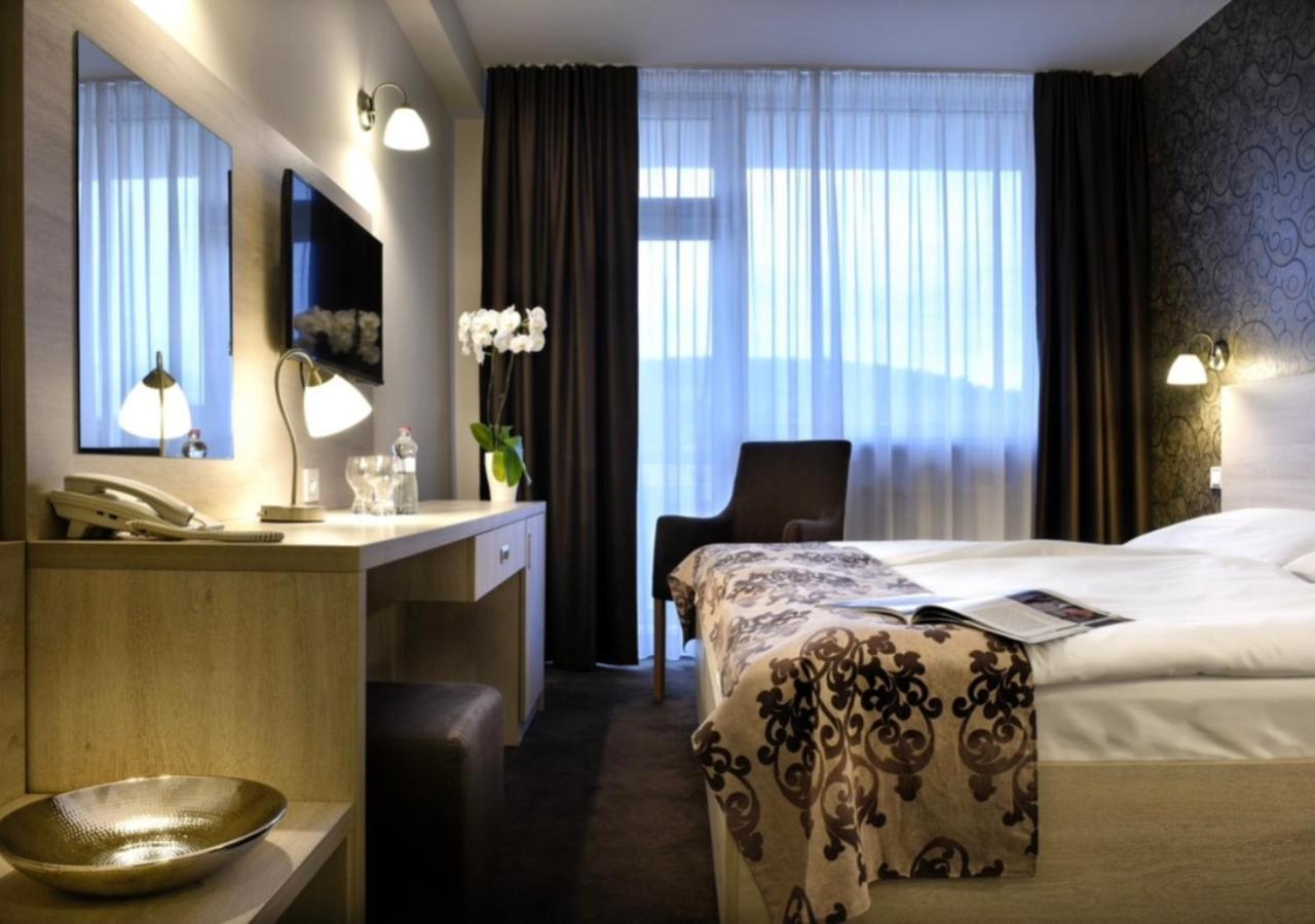 Hotel Magnolia Пьештяни Экстерьер фото
